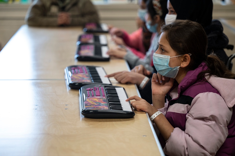 Music lessons at Task Force Liberty