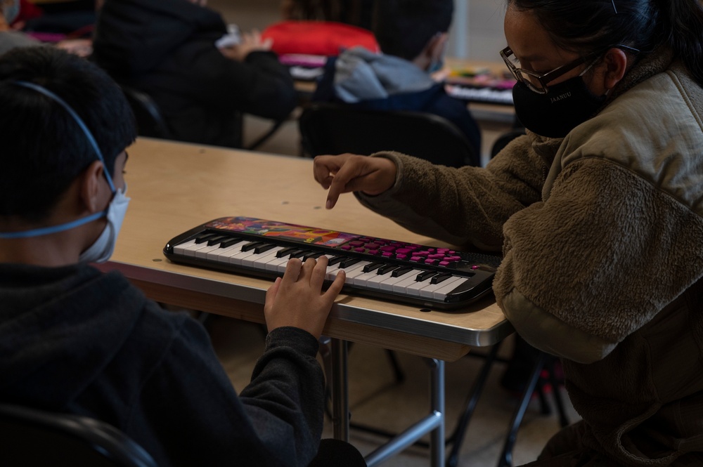Music lessons at Task Force Liberty