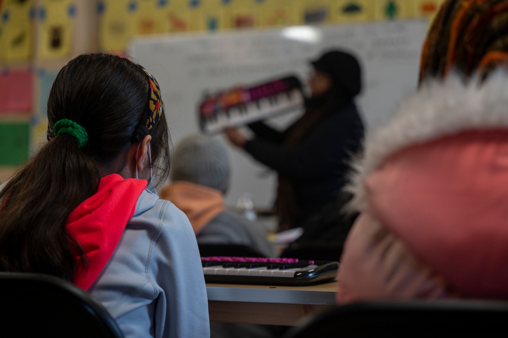 Music lessons at Task Force Liberty