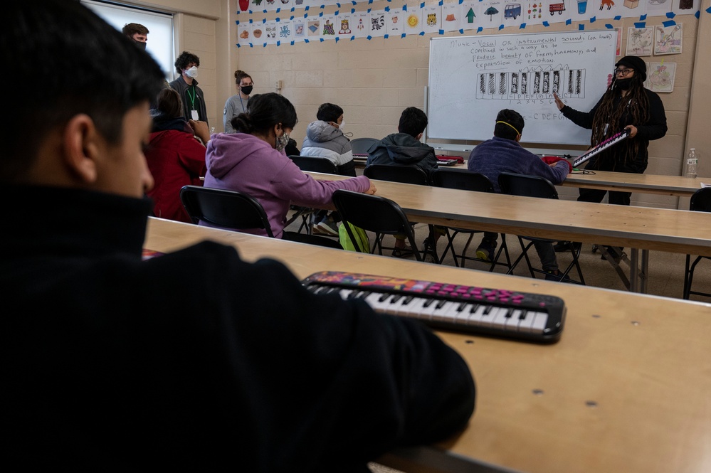 Music lessons at Task Force Liberty