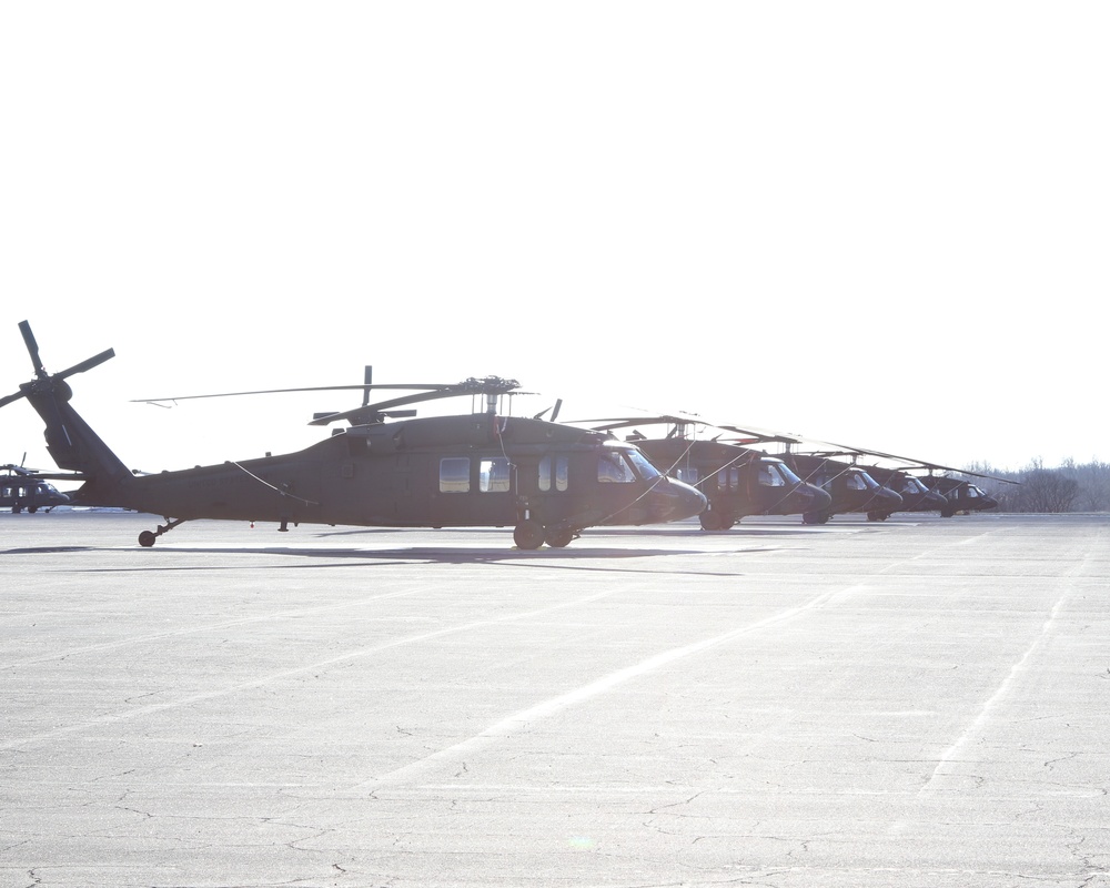 A lineup of UH-60 Black Hawk helicopters on the Muir Army Airfield