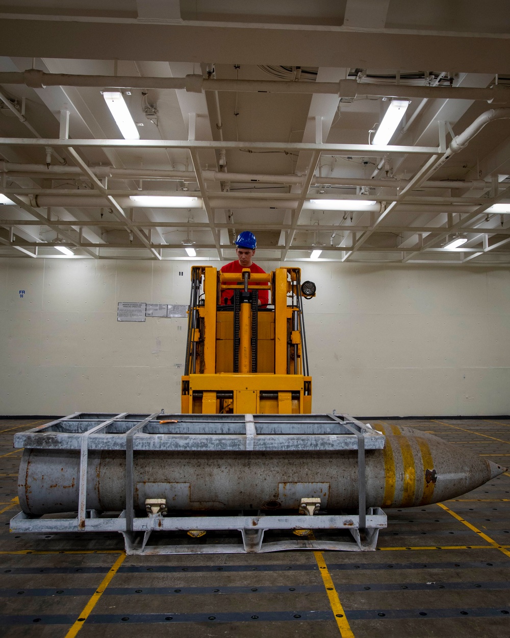 GHWB Sailor Transports Ammunition