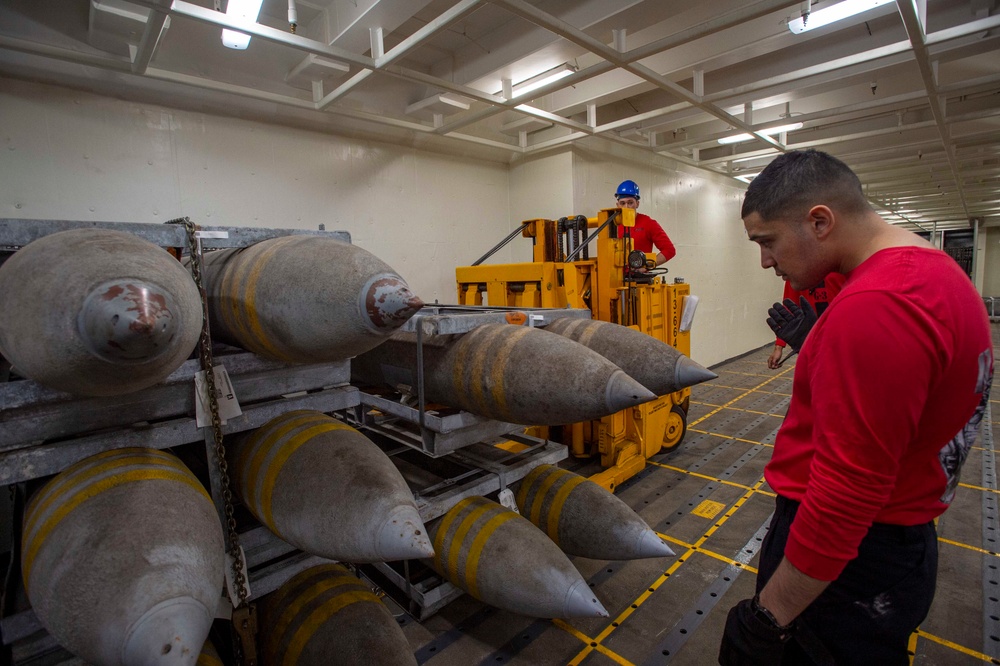 GHWB Sailor Transports Ammunition