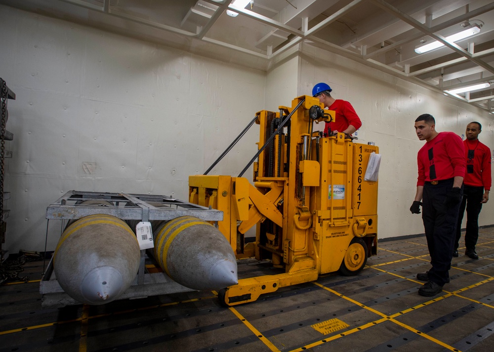 GHWB Sailor Transports Ammunition