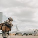 U.S. Marines work with the U.S. Navy on refueling a P-8A Poseidon during Noble Fusion