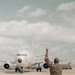 U.S. Marines work with the U.S. Navy on refueling a P-8A Poseidon during Noble Fusion