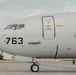 U.S. Marines work with the U.S. Navy on refueling a P-8A Poseidon during Noble Fusion