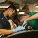 Abraham Lincoln Sailors conduct aircraft maintenance