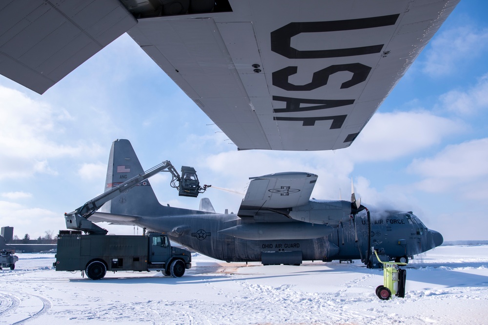 179th Airlift Wing De-ices C-130H after storm