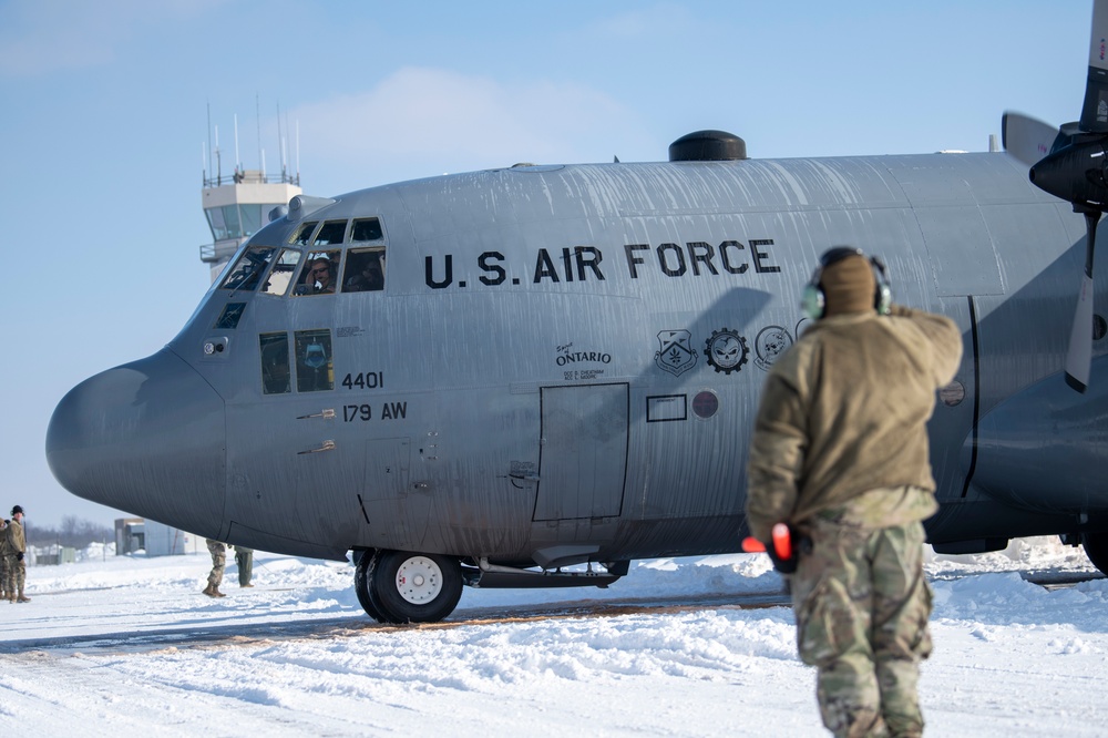 179th Airlift Wing De-ices C-130H after storm