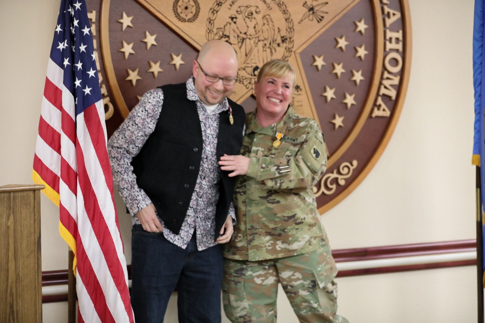 Chief Warrant Officer 4 Kristen D. Guffy and Master Sgt. Donald T. Seymour Retire from Service
