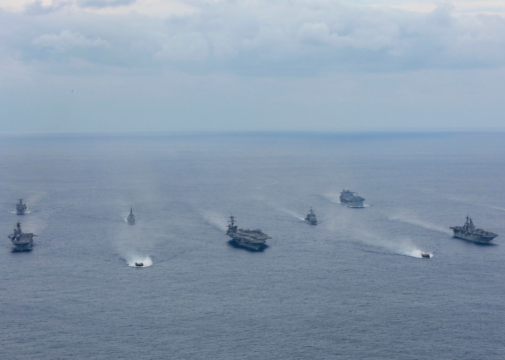 Abraham Lincoln sails in formation during exercise Noble Fusion