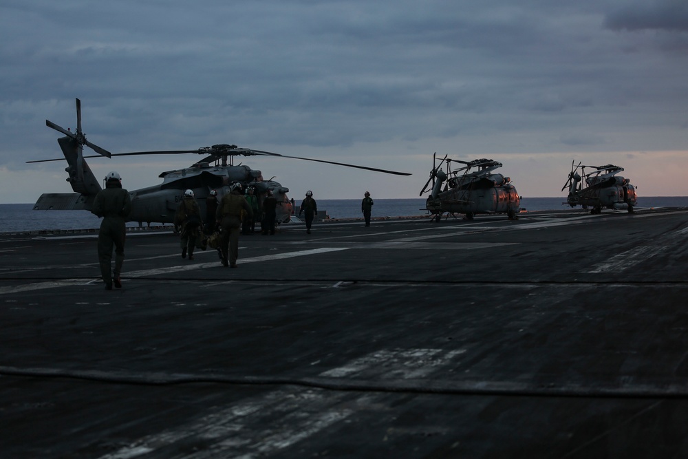 Abraham Lincoln sails in formation during exercise Noble Fusion