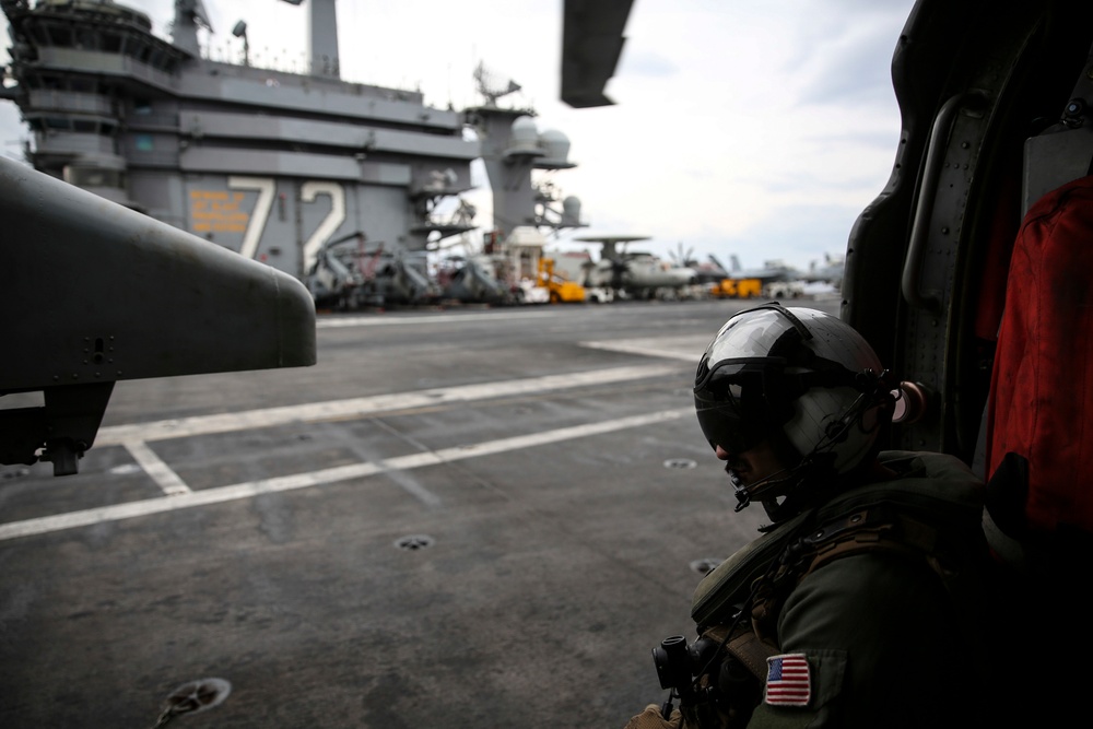 Abraham Lincoln sails in formation during exercise Noble Fusion