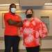 Spc. Jamarree Daniels and Ms. Marivic Catimon celebrate National Wear Red Day