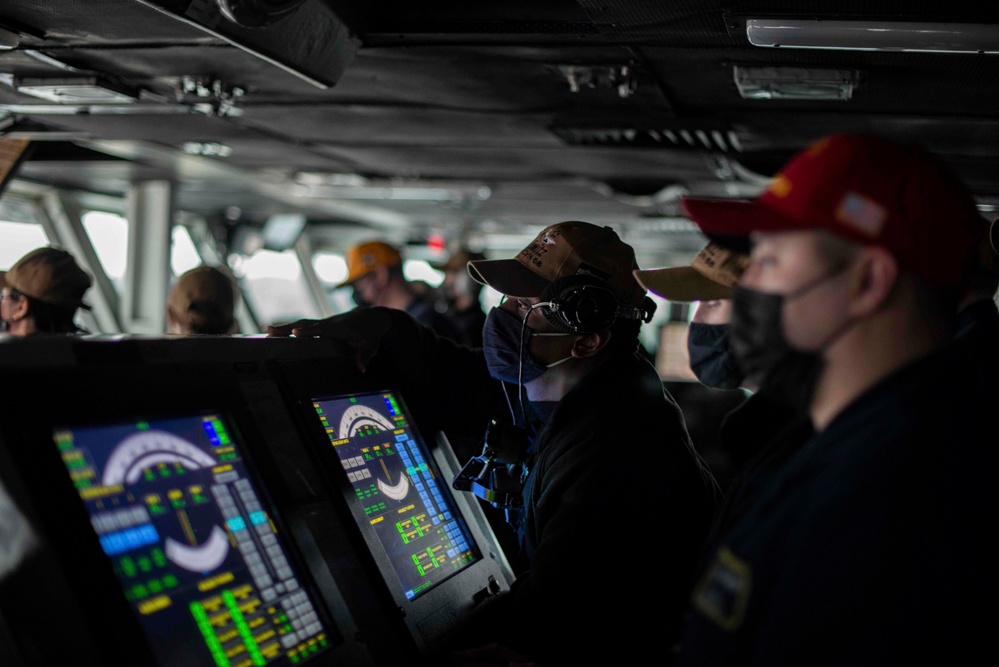 Sailors Navigate Ship