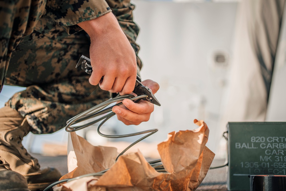 EOD Marines conduct time fuse burn aboard USS Portland (LPD 27)