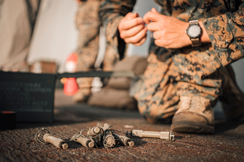 EOD Marines conduct time fuse burn aboard USS Portland (LPD 27)