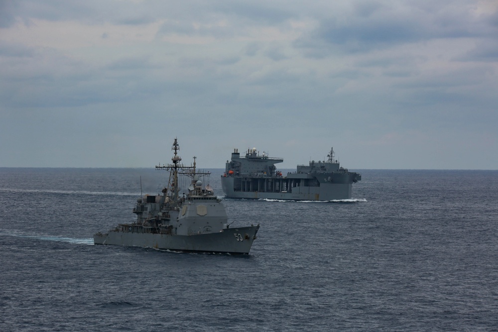 Abraham Lincoln sails in formation during exercise Noble Fusion