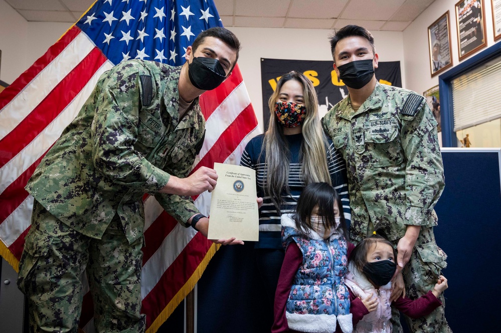 Fairfax, Va., native reenlists for six years in the Navy