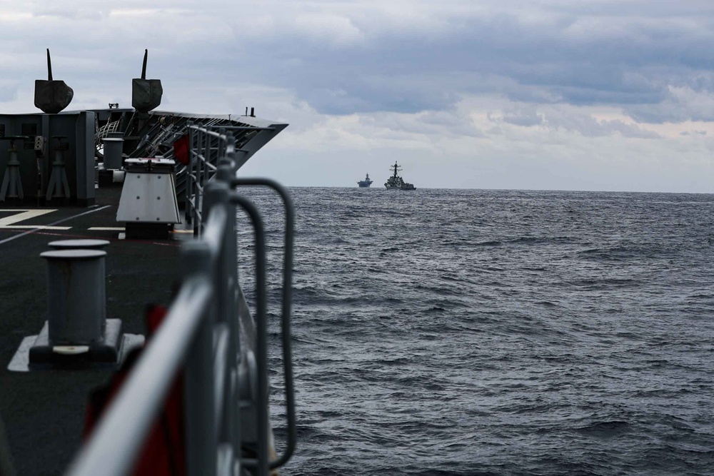 Ships of the America and Essex Amphibious Ready Groups, and Abraham Lincoln Strike Group, sail in formation with the Japan Maritime Self-Defense Force during exercise Noble Fusion.