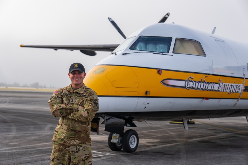 The Army Parachute Team's aviation crew prepares aircraft