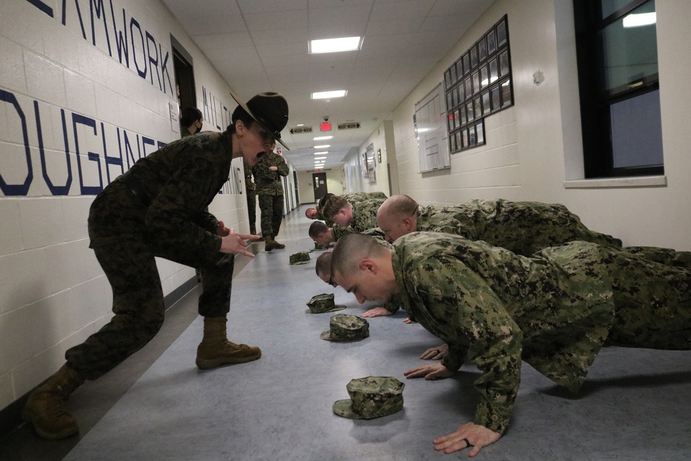 220204-N-N0485-0033 NEWPORT, R.I. (Feb. 4, 2022) OCS Navy Working Uniform (NWU) inspection