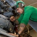 Abraham Lincoln Sailors conduct aircraft maintenance