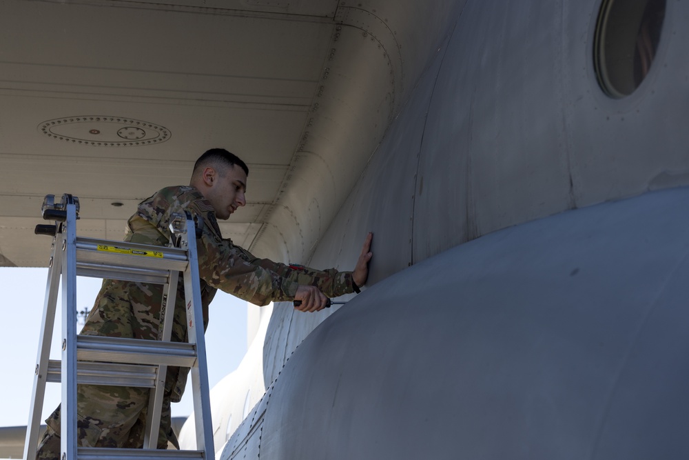 C130J Crew Chief Maintains Aircraft