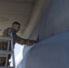 C130J Crew Chief Maintains Aircraft