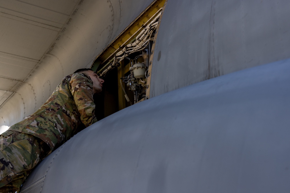 C130J Crew Chief Maintains Aircraft