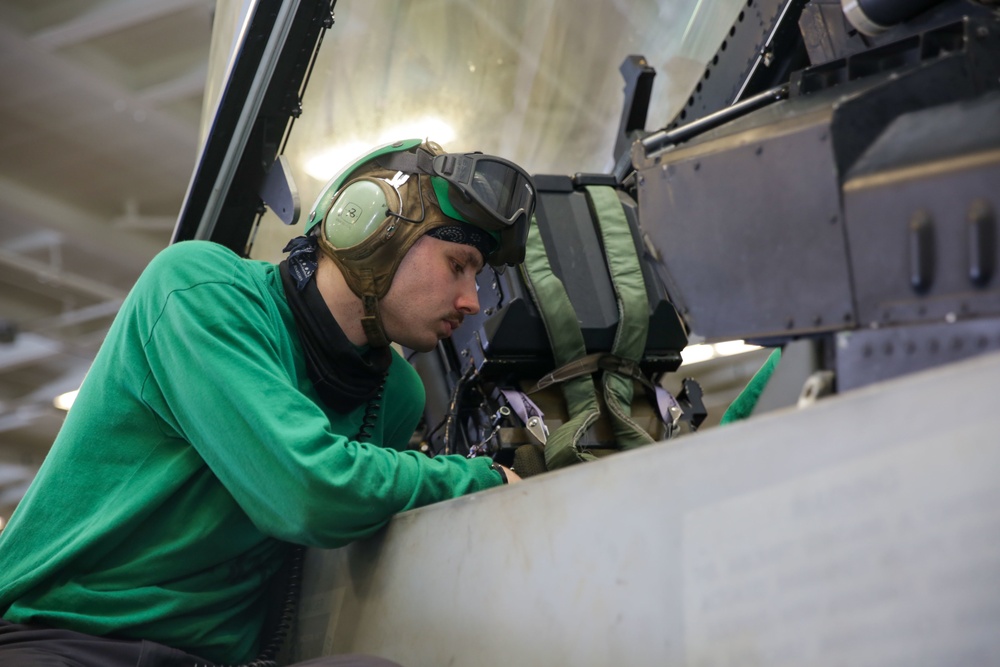 Abraham Lincoln Sailors conduct aircraft maintenance