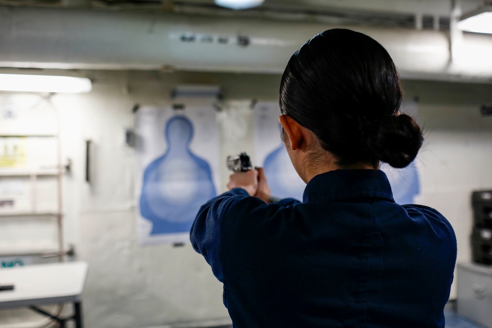 Abraham Lincoln Sailors practice weapon skills