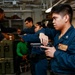 Abraham Lincoln Sailors practice weapon skills