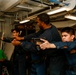 Abraham Lincoln Sailors practice weapon skills