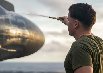 VMA-214, 11th MEU conducts routine corrosion prevention cleaning aboard USS Essex (LHD 2)