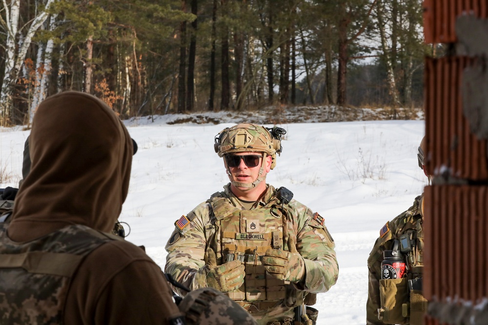 JMTGU Soldiers develop teaching methodology with OC/T's at International Peacekeeping and Security Center