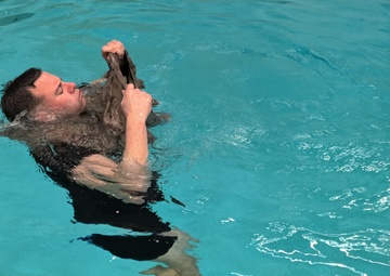 U.S. Army Nuclear Disablement Teams conduct water survival training at U.S. Naval Academy