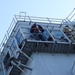 SAN DIEGO (Feb. 9, 2022) Sailors clean windows above