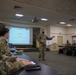 U.S  Air Force Military Medical Team Receive a Joint Reception, Staging, Onward Movement and Integration Brief at Lawrence General Hospital