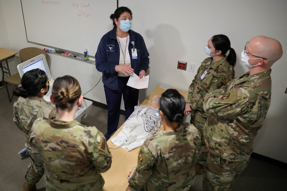 U.S  Air Force Military Medical Team Receive a Joint Reception, Staging, Onward Movement and Integration Brief at Lawrence General Hospital