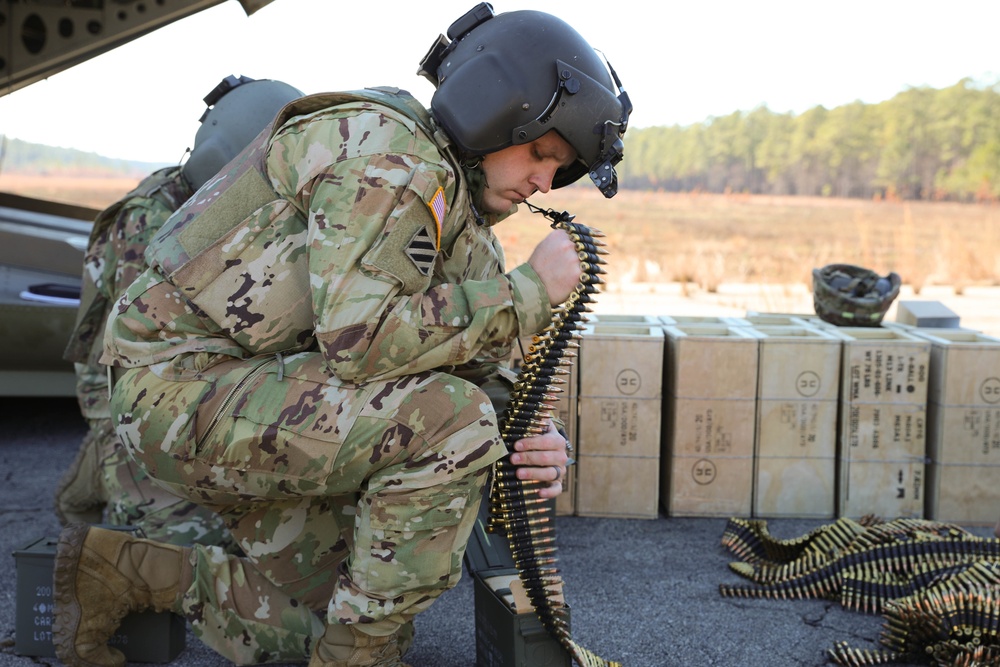 3rd Combat Aviation Brigade Soldiers send rounds down range during an aerial gunnery exercise at Fort Stewart, Georgia.