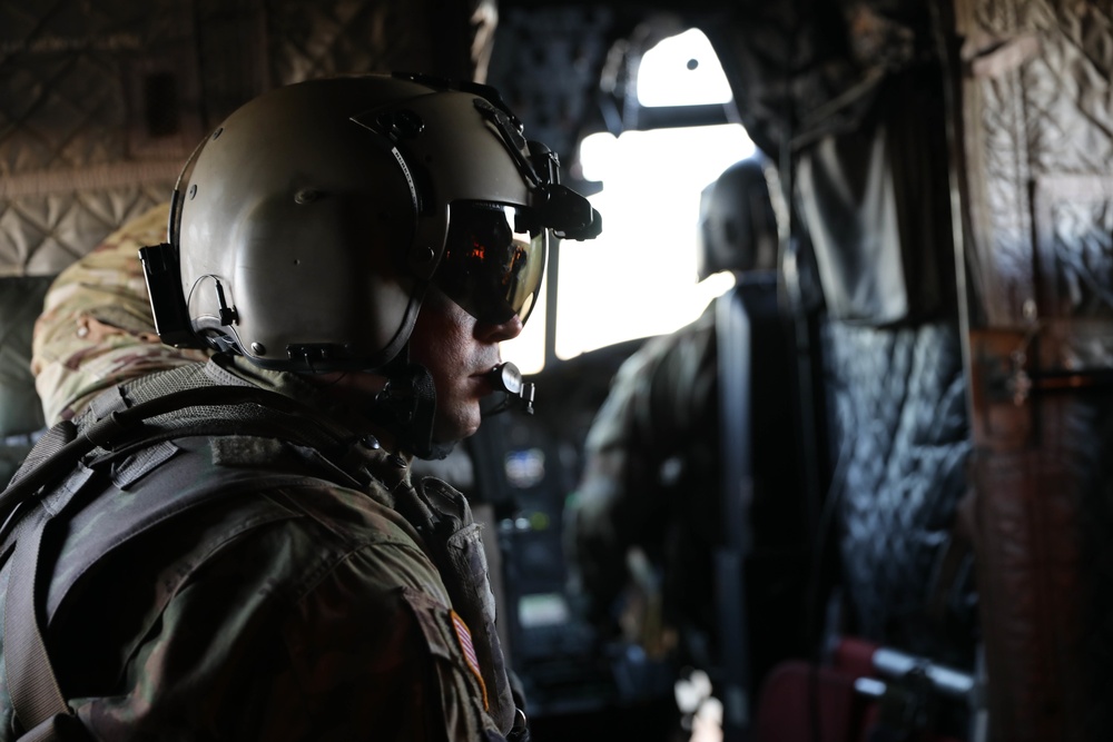 3rd Combat Aviation Brigade Soldiers send rounds down range during an aerial gunnery exercise at Fort Stewart, Georgia.