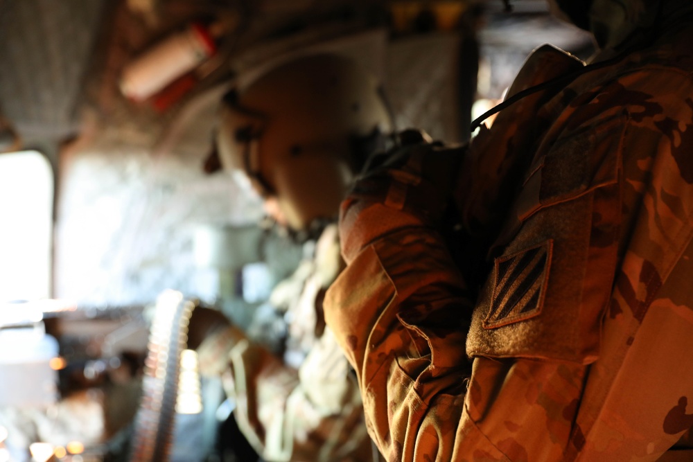 3rd Combat Aviation Brigade Soldiers send rounds down range during an aerial gunnery exercise at Fort Stewart, Georgia.