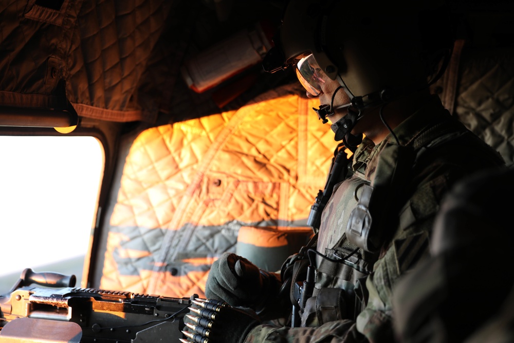 3rd Combat Aviation Brigade Soldiers send rounds down range during an aerial gunnery exercise at Fort Stewart, Georgia.