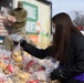 Lilac Festival Princesses' help Team Fairchild during the Harvest Food Distribution