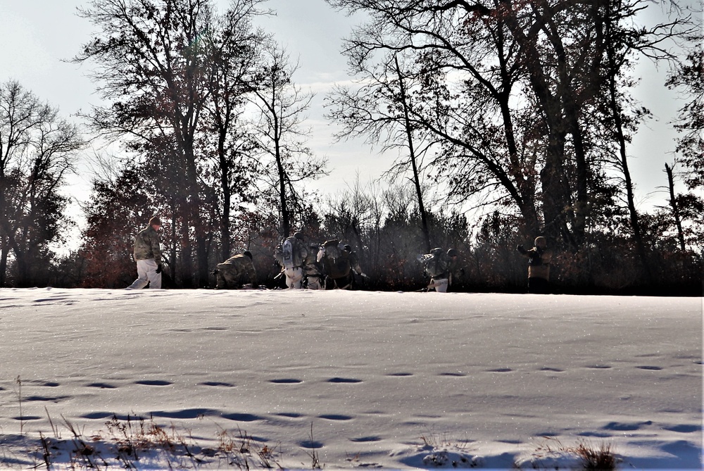 Cold-Weather Operations Course class 22-03 students build Arctic tents on Fort McCoy's South Post