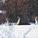 Cold-Weather Operations Course class 22-03 students build Arctic tents on Fort McCoy's South Post