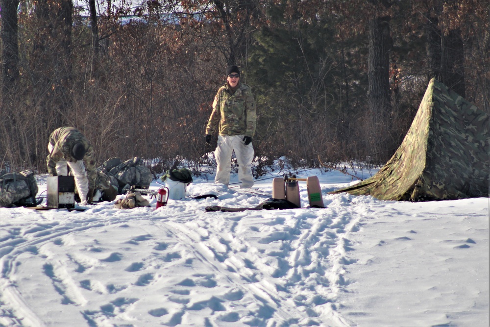 Cold-Weather Operations Course class 22-03 students build Arctic tents on Fort McCoy's South Post