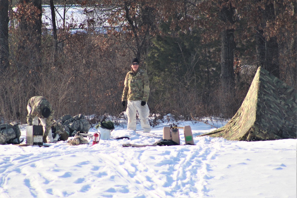 Cold-Weather Operations Course class 22-03 students build Arctic tents on Fort McCoy's South Post